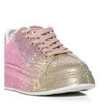 Glittery sneaker on a white background with 'Akira' brand visible